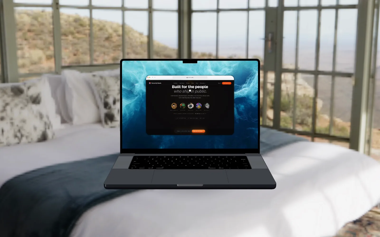 The first pass: a 3D MacBook floating above a bed in a bright bedroom environment, with nothing underneath it
